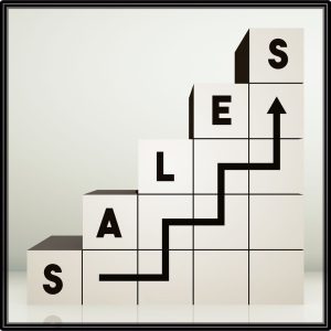 image of letter tiles spellling out the word sales and an arrow on other tiles moving upward